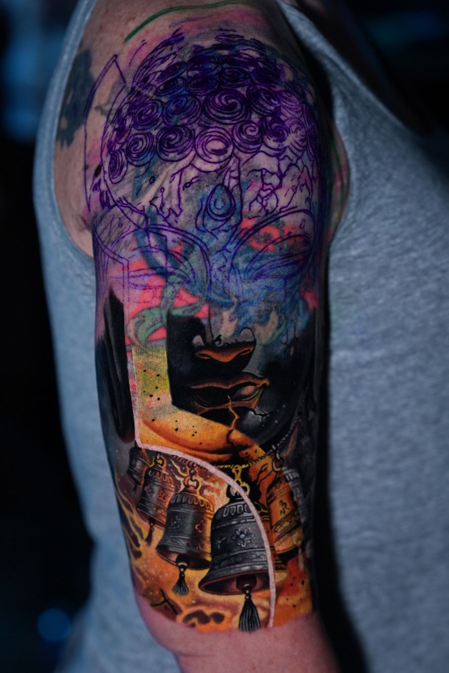 Shoulder-to-elbow cover-up tattoo in progress by Frank Tattoo Arts