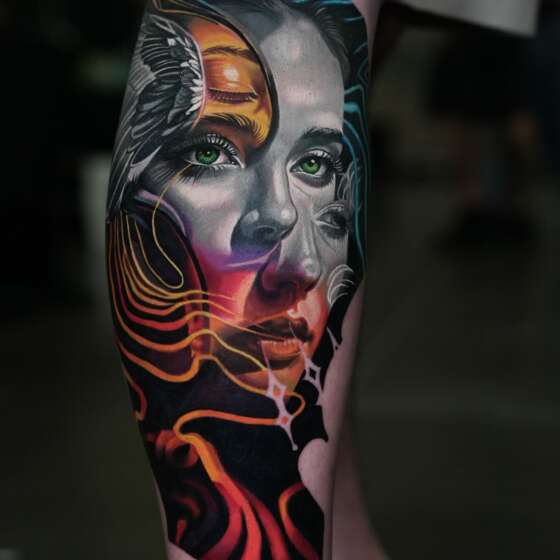 Calf tattoo by Frank Tattoo Arts featuring a woman’s portrait with green eyes and orange and purple accents.